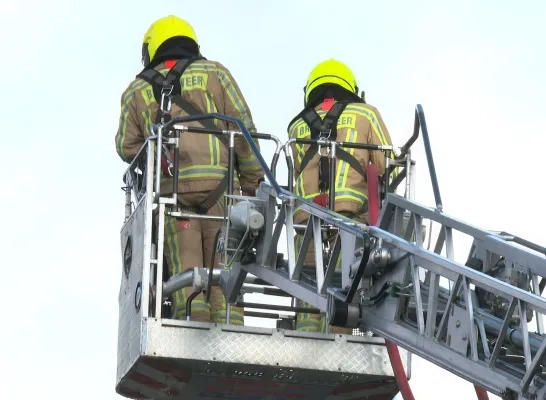 Brandweer op ladder Brandweer op ladder