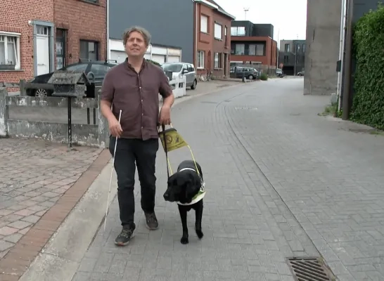 Blinde Harry en geleidehond Scott Dodentocht Bornem