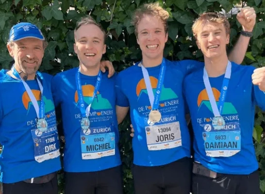 vader en sportieve zonen.