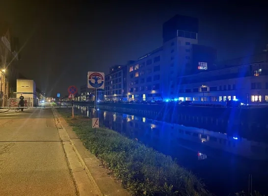 Man in Leuvense Vaart in Mechelen