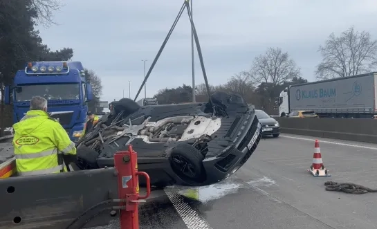 auto over de kop E313