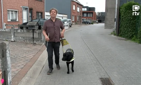 Blinde Harry en geleidehond Scott Dodentocht Bornem