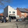 Eerbetoon aan Trapper-winkel door scouts en gidsen