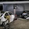 Uitgebrande auto's bij garage Jacobs