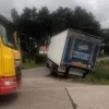 vrachtwagen in gracht tongerlo